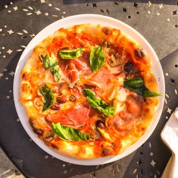 Bella Napoli signature dishes Prosciutto and Arugula Pizza, various pasta dishes, Italian deli sandwiches, Cannoli.